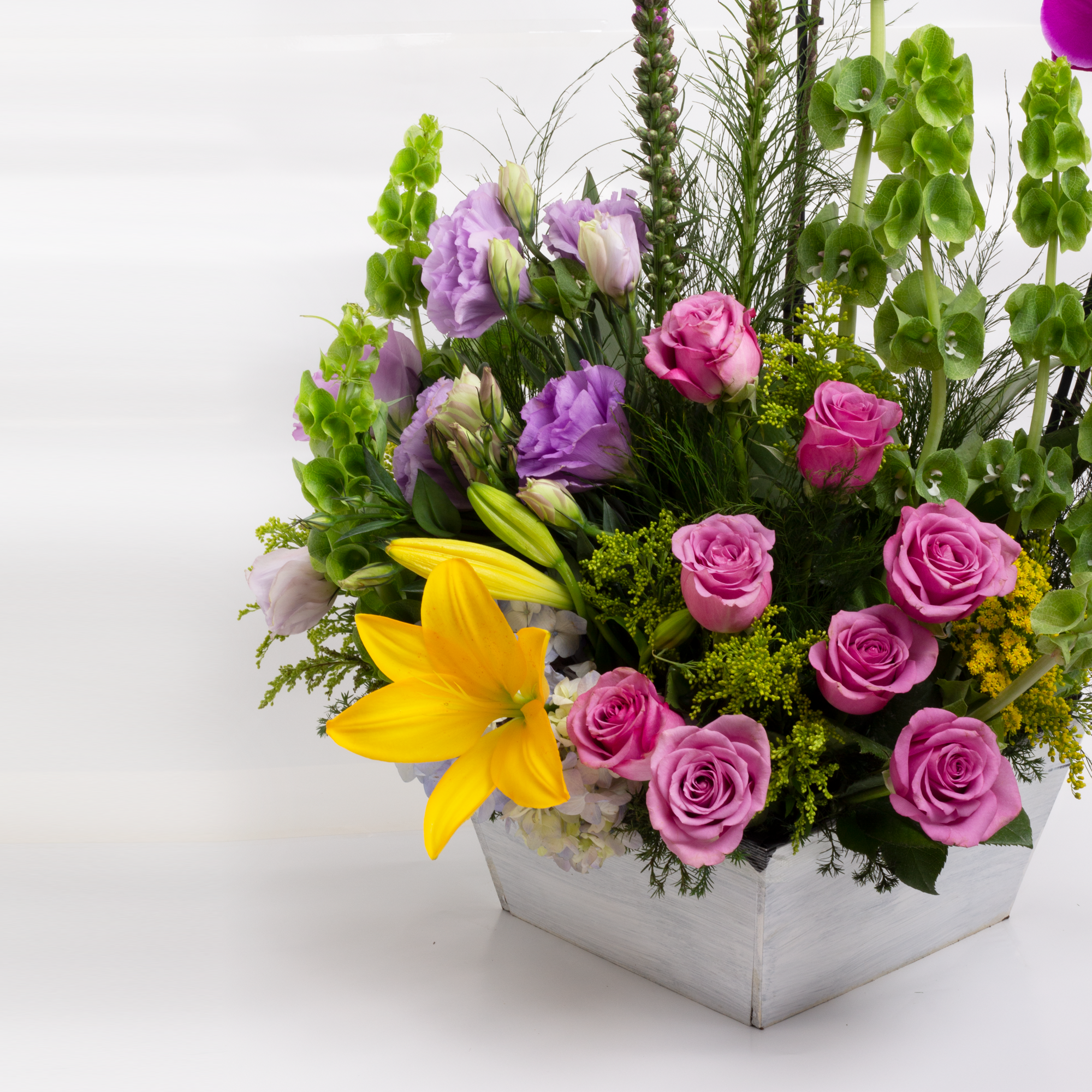 Arreglo Orquídeas Rosas y Fiucsia
