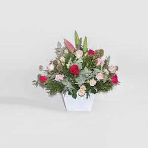 Arreglo de Rosas y Flores Acapulco con base Blanca