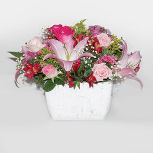 Arreglo de Rosas y Flores Acapulco con base Vintage
