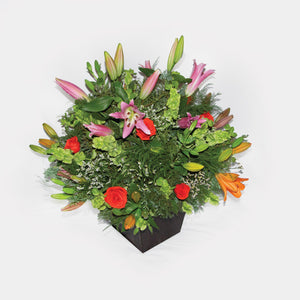 Arreglo Rosas Coral y flores Acapulco
