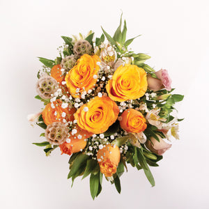 Arreglo de Rosas Amarillas con Astromelias en Florero de Cristal Redondo