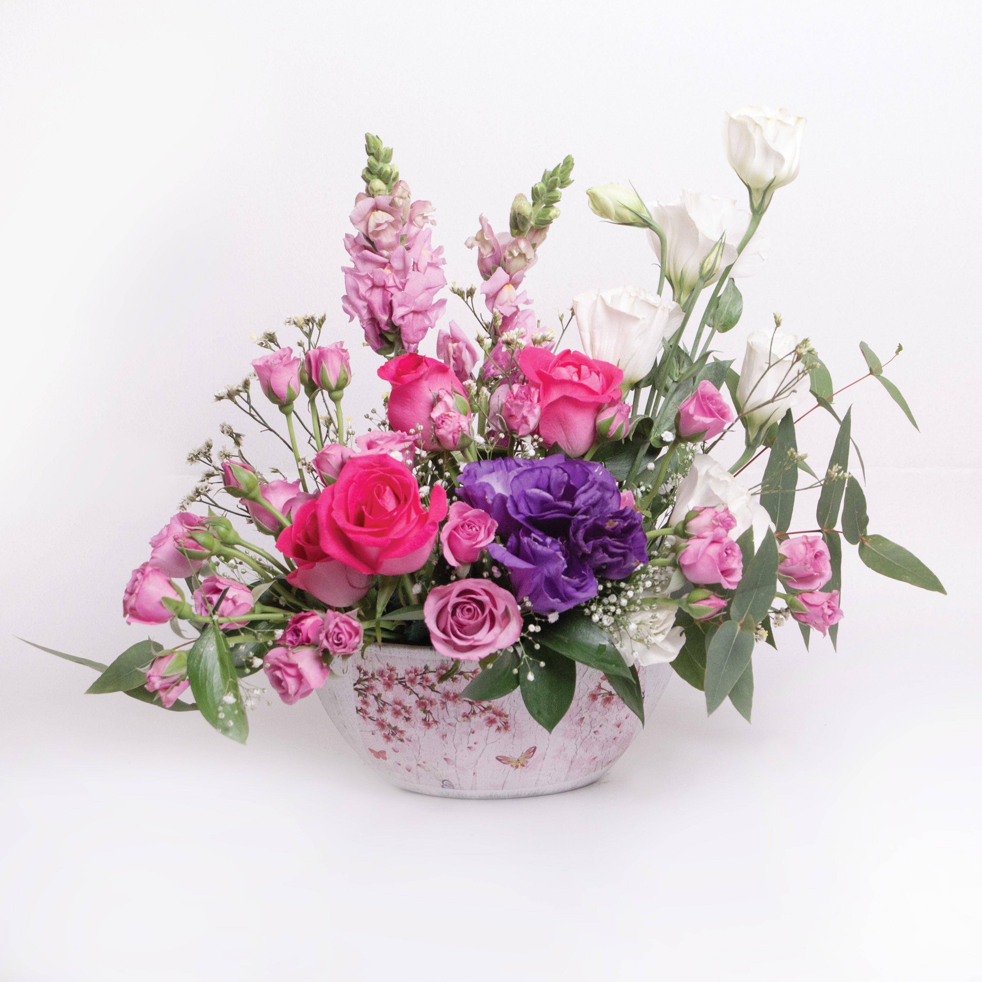 Arreglo de Rosas en base vintage