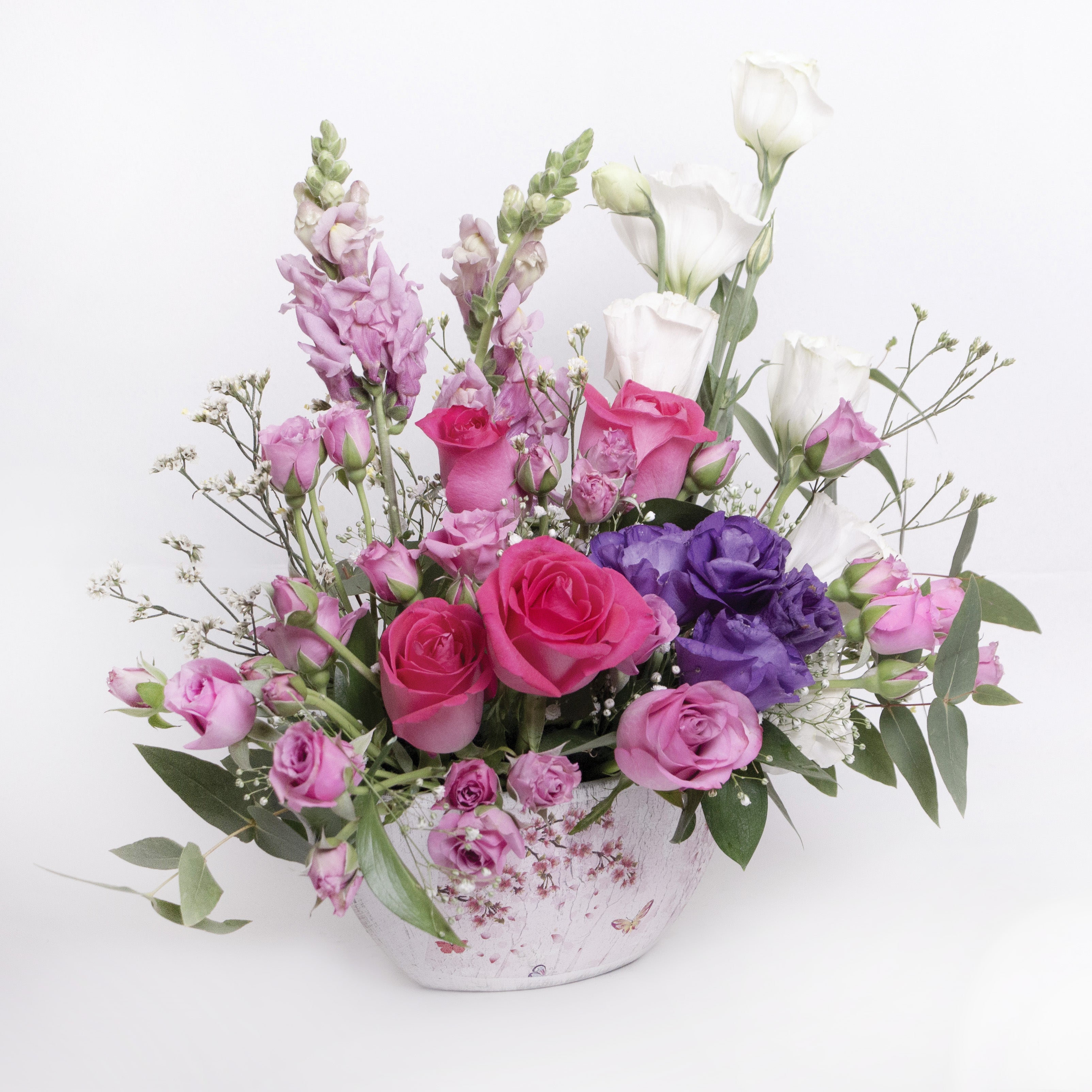Arreglo de Rosas en base vintage